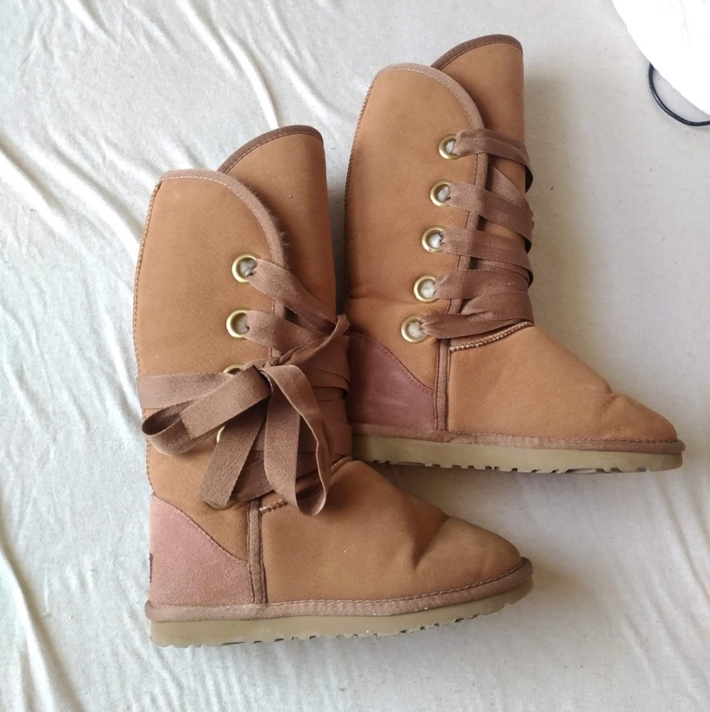Tall, lace up Ugg boots